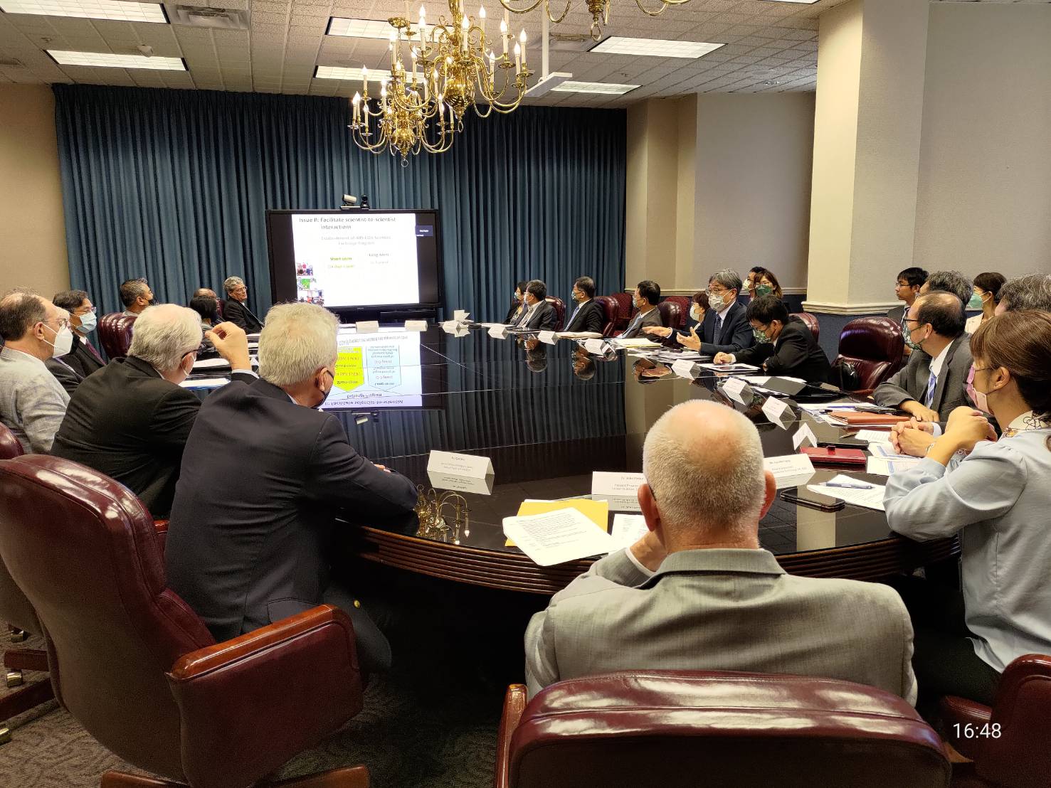 A photo of discussions at the 2022 Bilateral Meeting on the Cooperative Program in Agricultural Sciences between AIT/USDA and TECRO/COA.