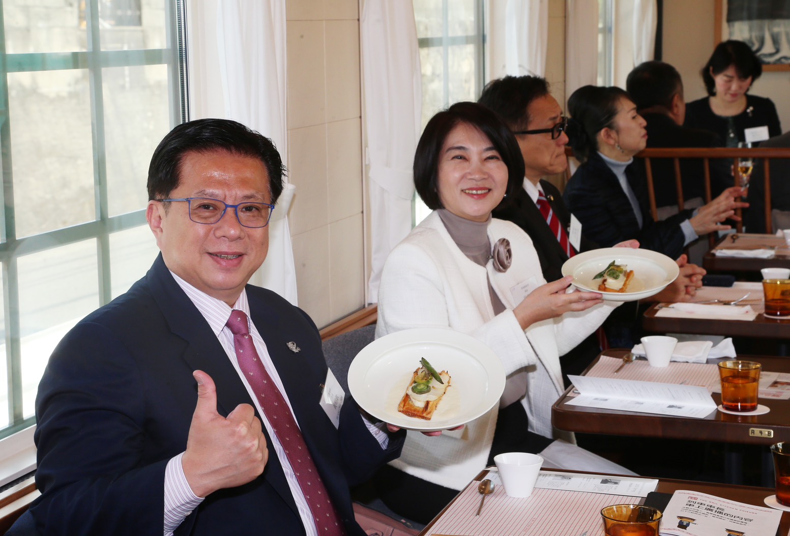 Photos of activities promoting Taiwanese grouper in overseas markets.