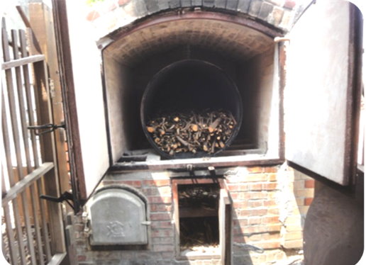 Picture 3: The third generation of biochar kiln in Dayou Village relies on hardwood as fuel to produce biochar.